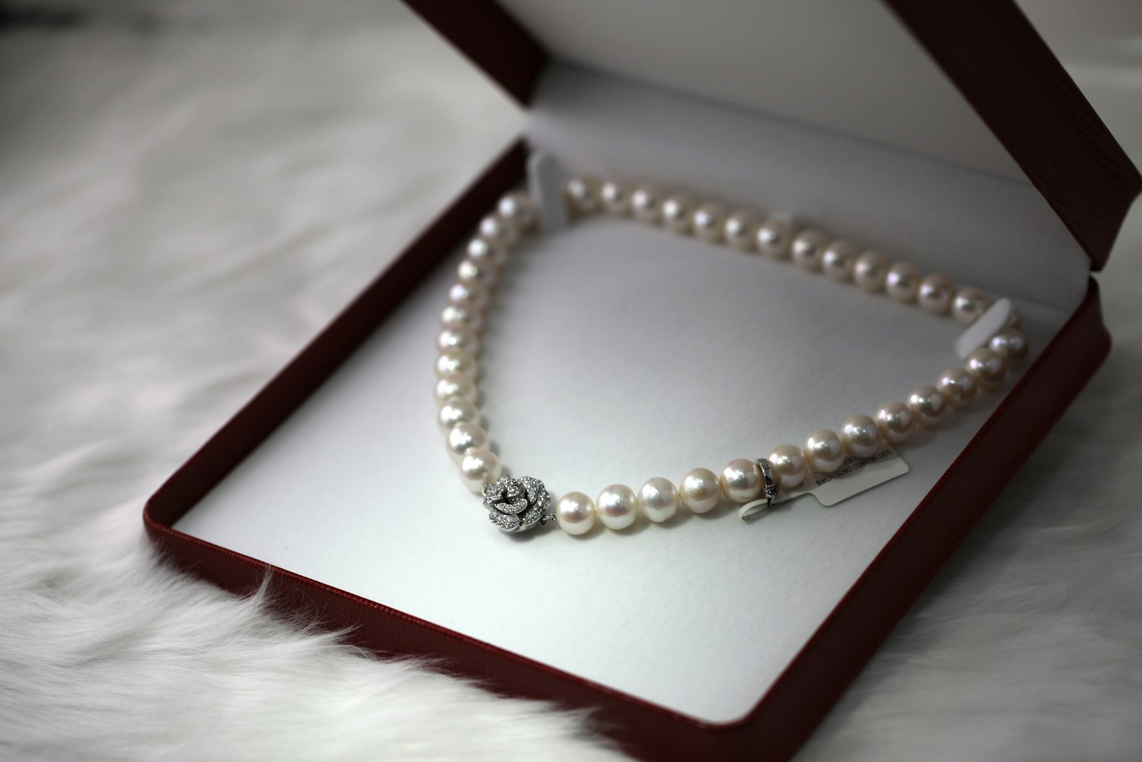 Pearl necklace presented in a red gift box